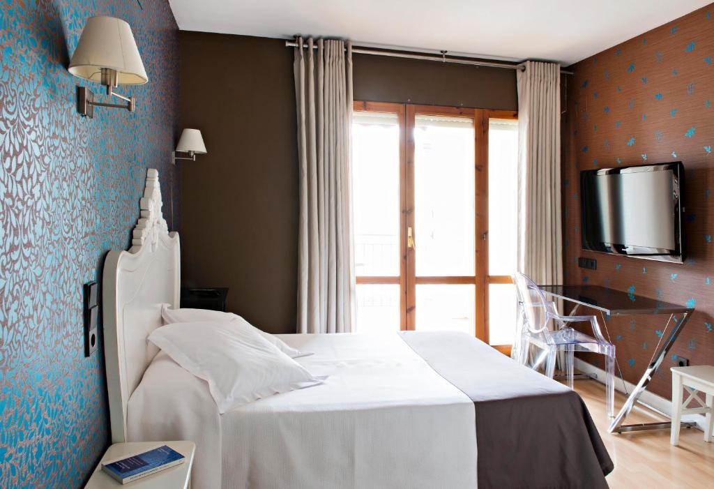 הואסקה Hospedium Hostal Un Punto Chic חדר תמונה