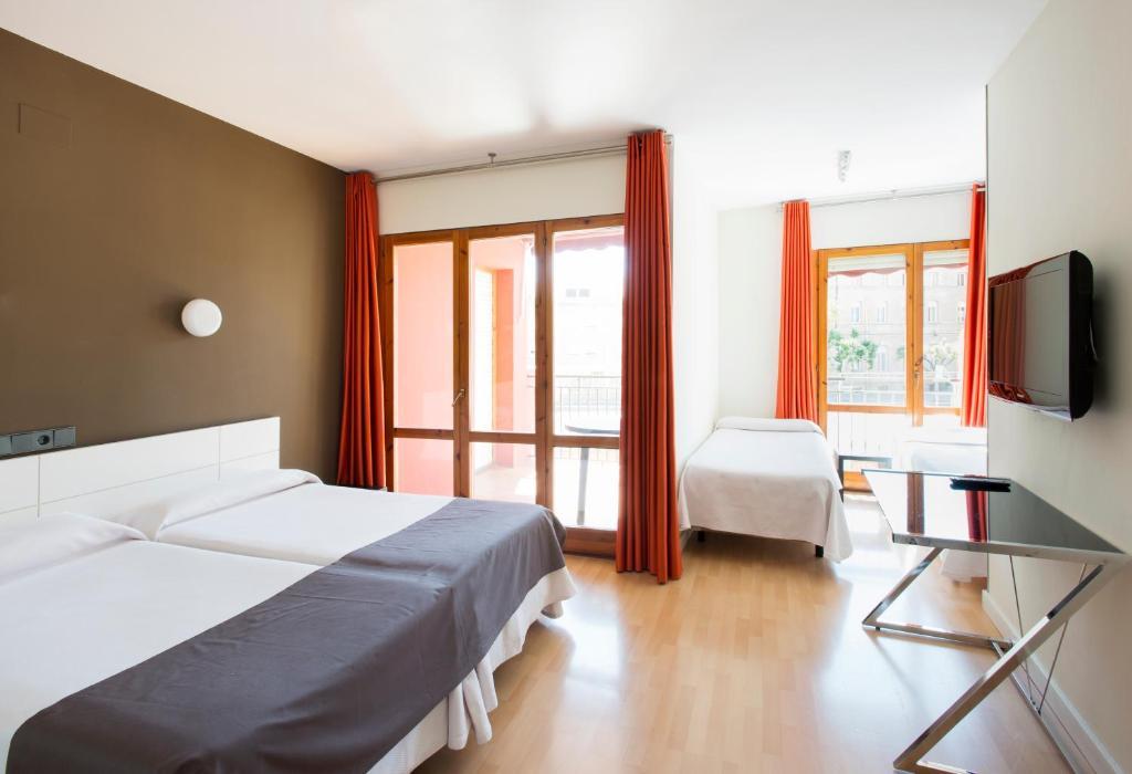 הואסקה Hospedium Hostal Un Punto Chic מראה חיצוני תמונה