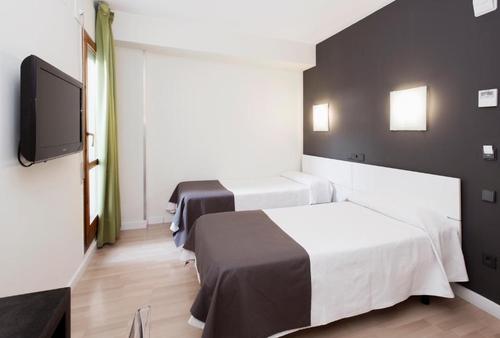 הואסקה Hospedium Hostal Un Punto Chic מראה חיצוני תמונה