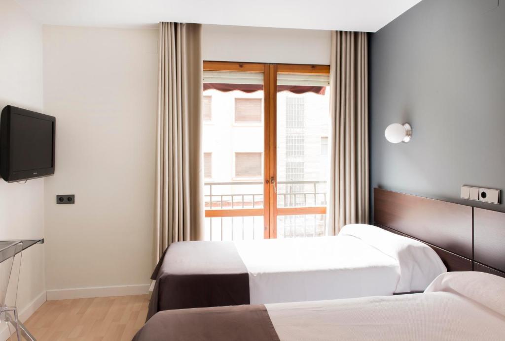 הואסקה Hospedium Hostal Un Punto Chic מראה חיצוני תמונה